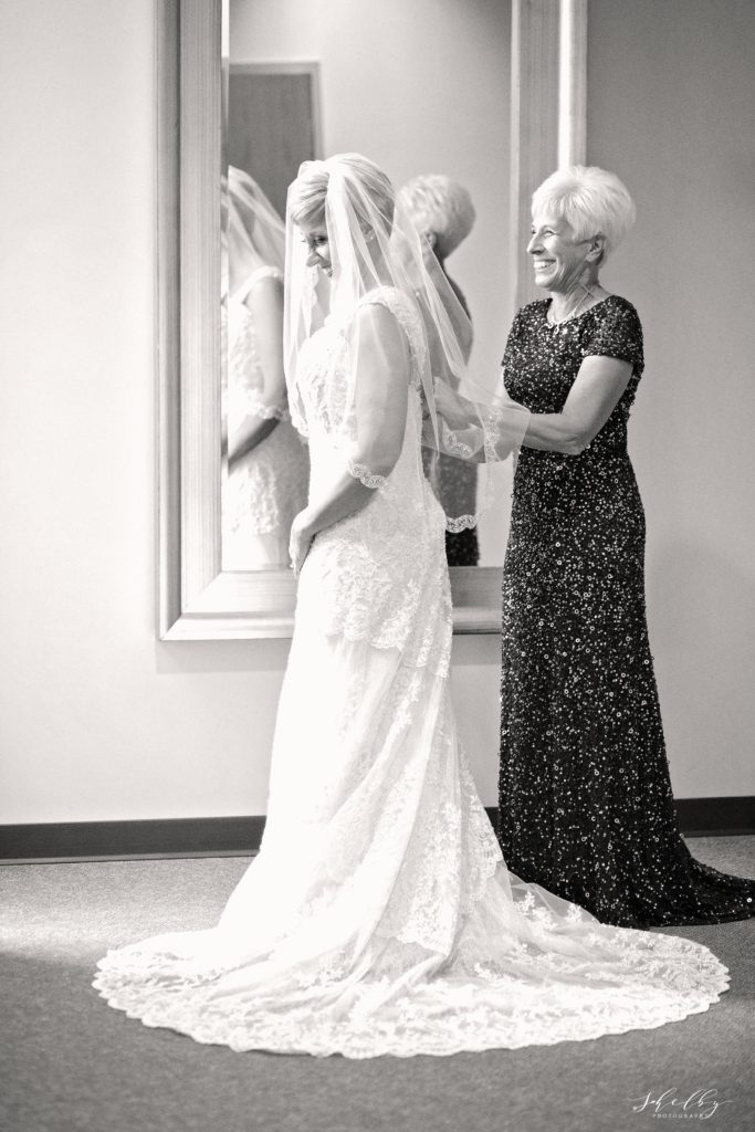 bride and mother of bride getting ready