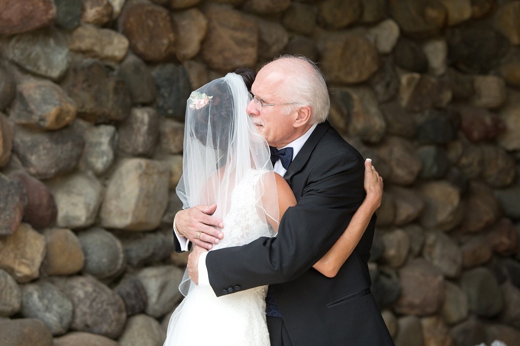 I love a first look between the bride and her dad. This one was so sweet