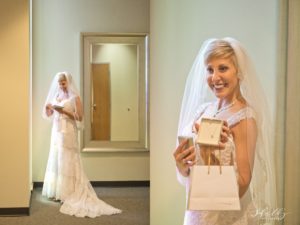 bride receiving gift from groom